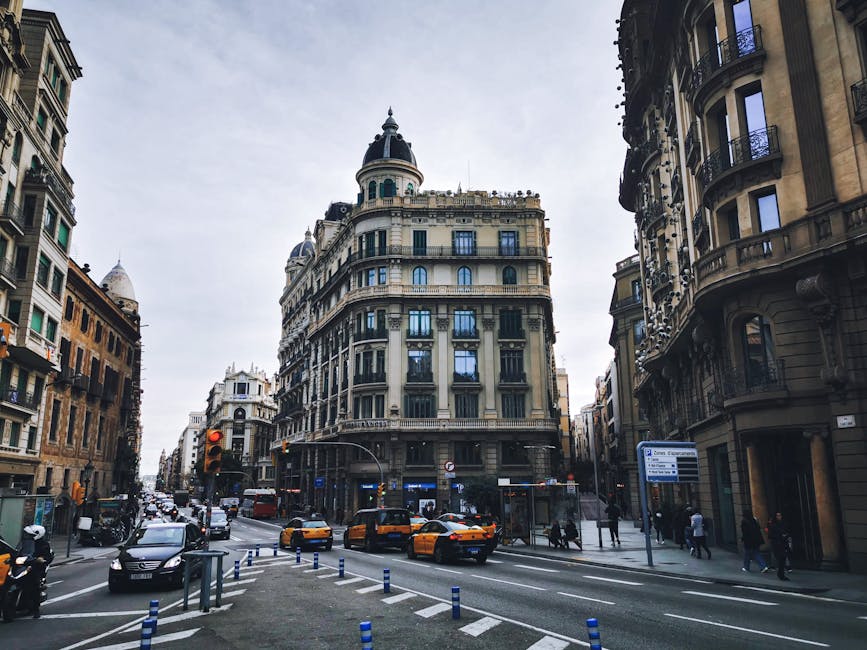 A view down Passeig de Gracia in Barcelona's Eixample with Casa Batllo visible on the right