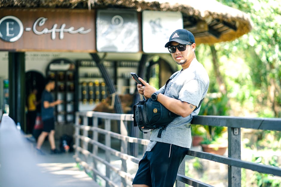 A traveller wearing a cross-body bag with the strap secure across their chest