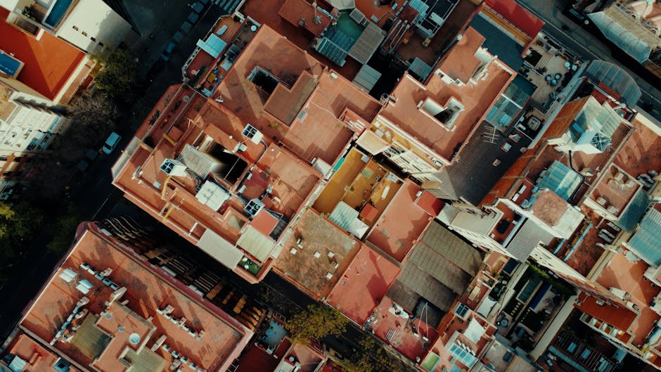 An aerial view of Barcelona's Eixample district showing its perfect geometric grid pattern