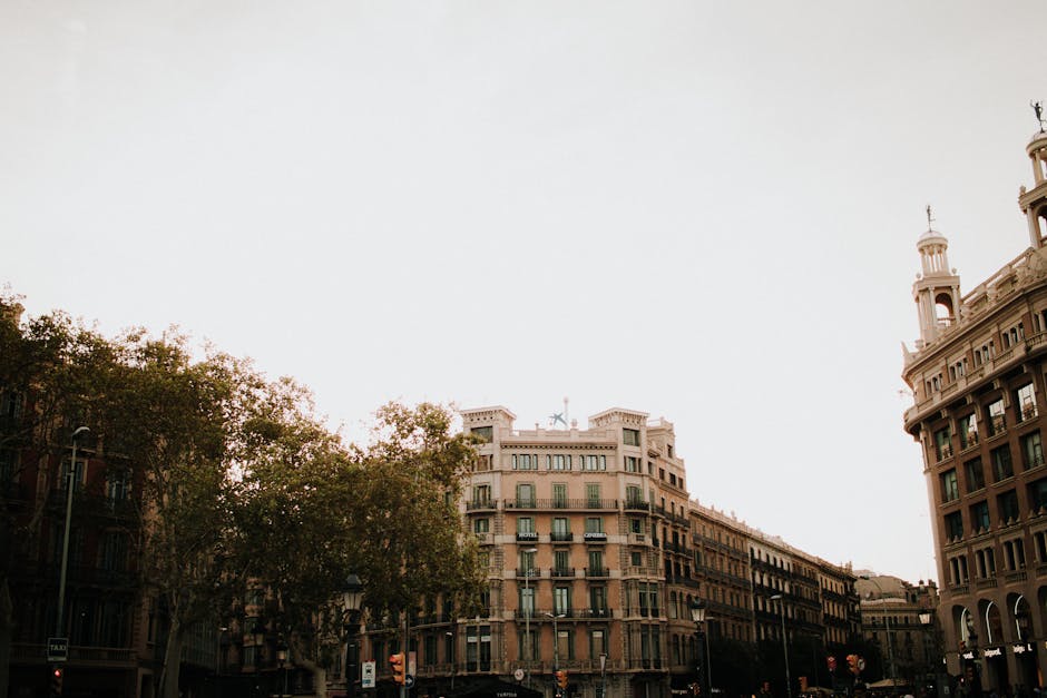 A view down Passeig de Gracia in the Eixample with Casa Batllo and Casa Mila visible in the distance