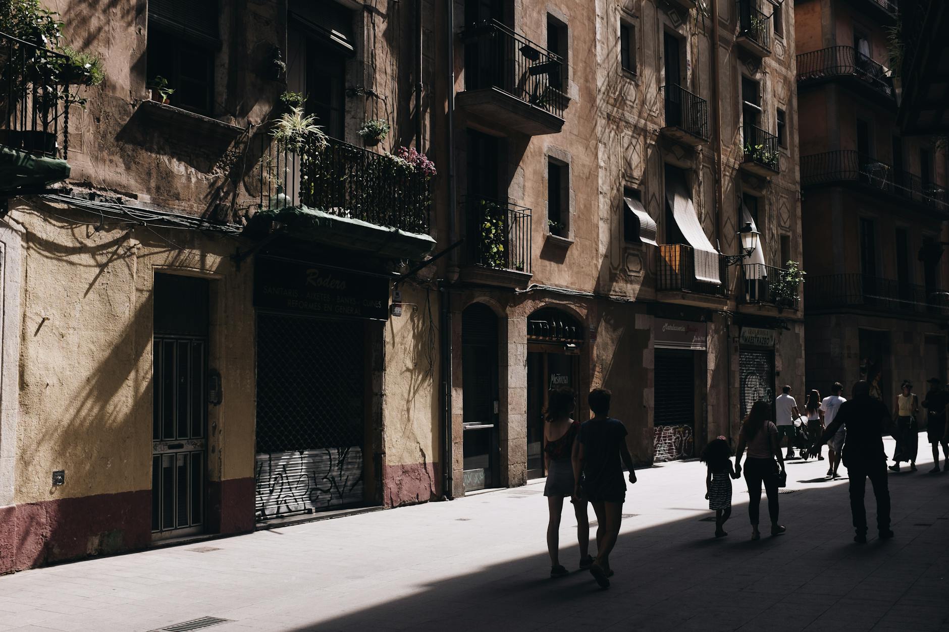 Bustling urban street scene in Barcelona with historical architecture