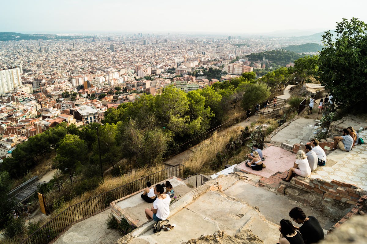 Panoramic 360-degree view of Barcelona from the Bunkers del Carmel at sunset