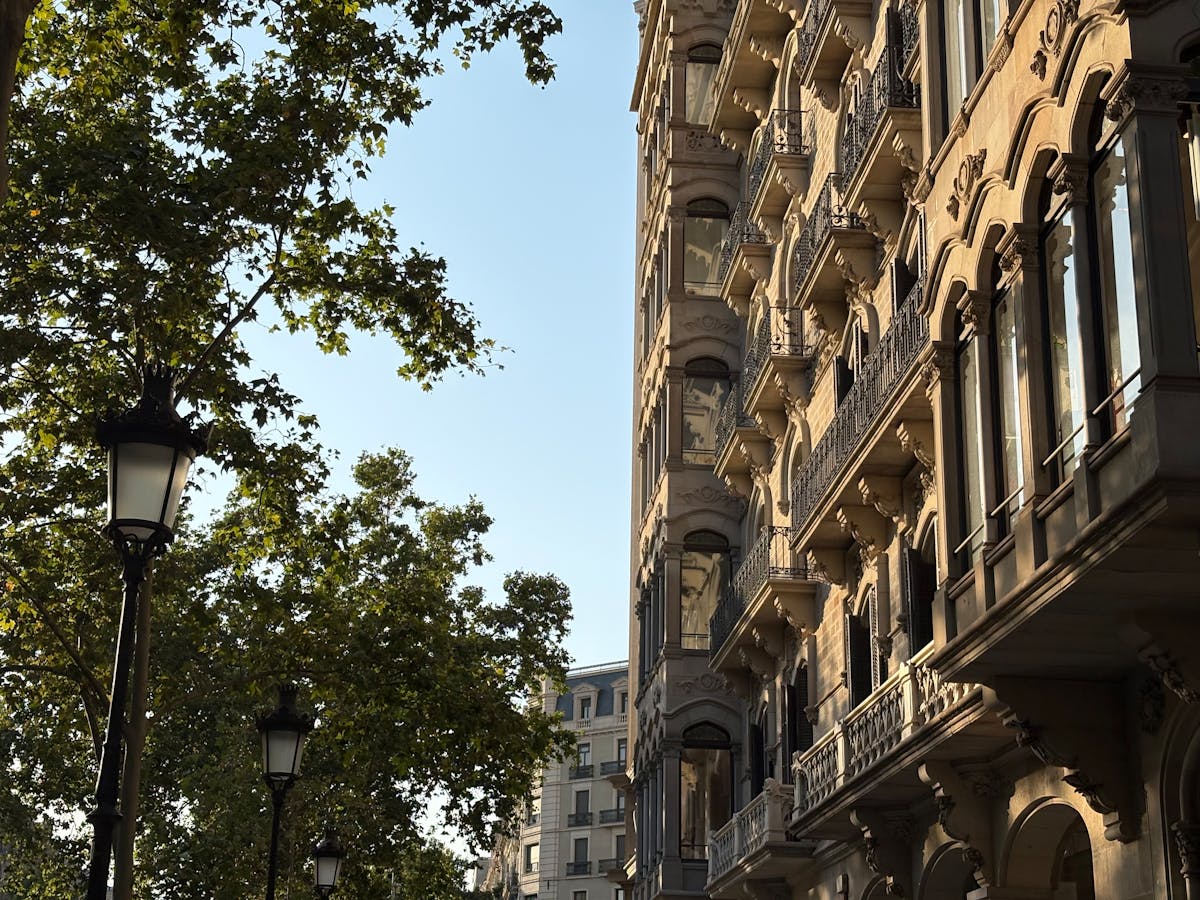Eixample district architecture with ornate modernist facades and grid street plan