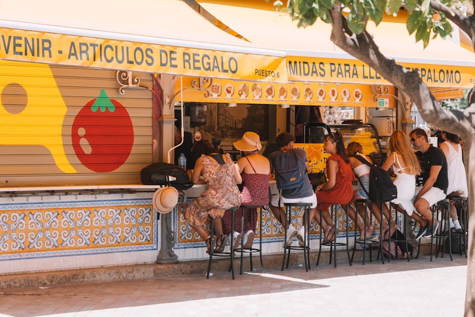 A small group on a Barcelona food tour at a tapas bar