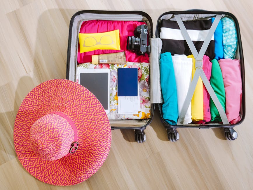 A traveller packing a suitcase with summer Barcelona clothing