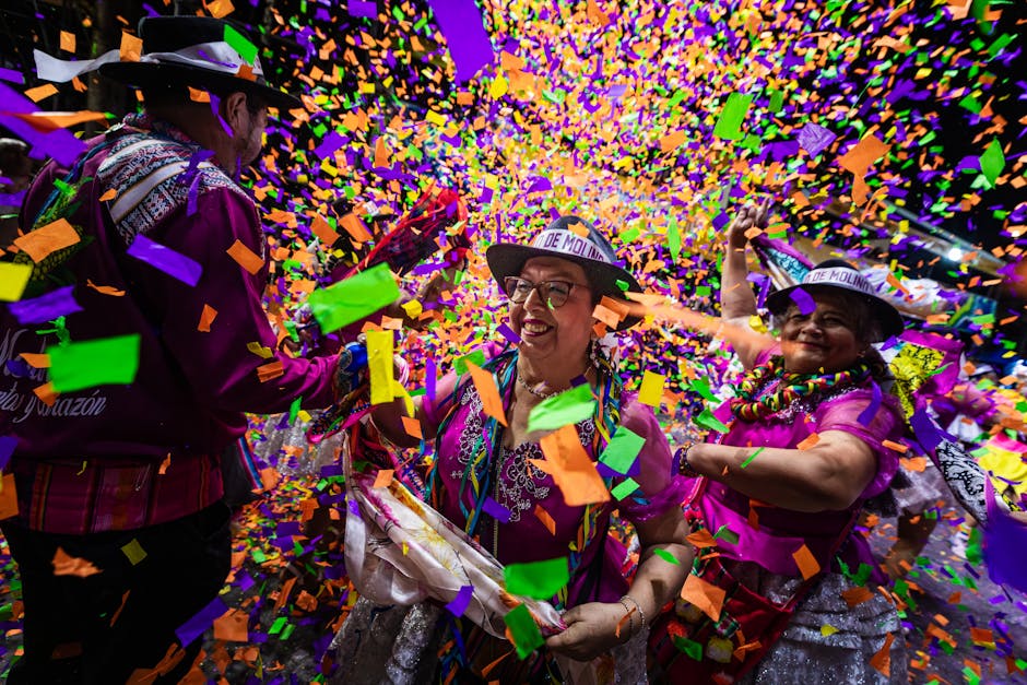 A confetti-filled Carnival parade in Barcelona with dancers in elaborate costumes