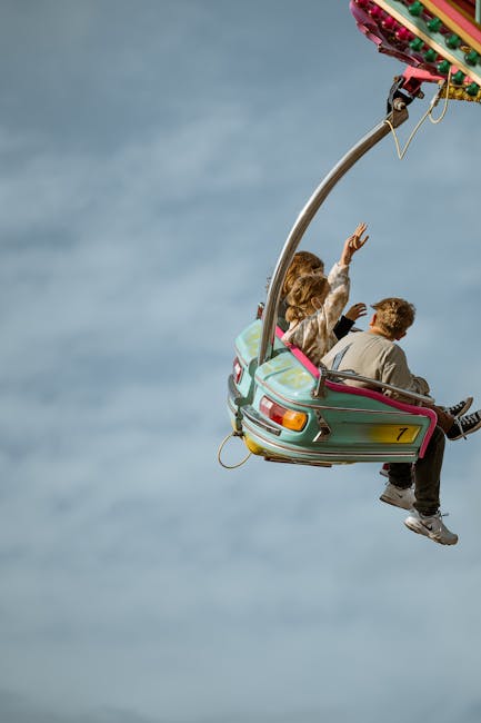 A family enjoying a Ferris wheel ride at Tibidabo amusement park