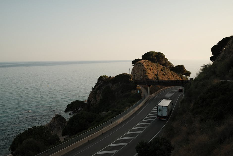 A highway running along the Spanish Mediterranean coast with mountains in the distance