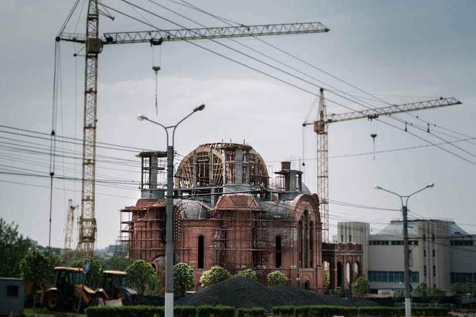 A construction site showing the ongoing work on a church facade
