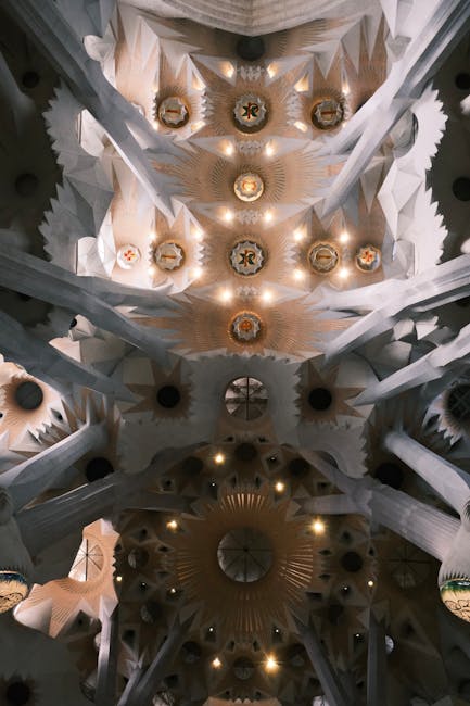 The colorful interior of Sagrada Familia with light streaming through stained glass