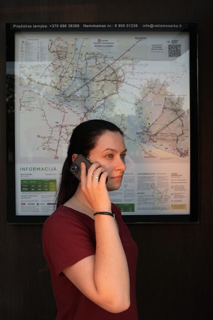 A tourist using their phone with a city map in Barcelona