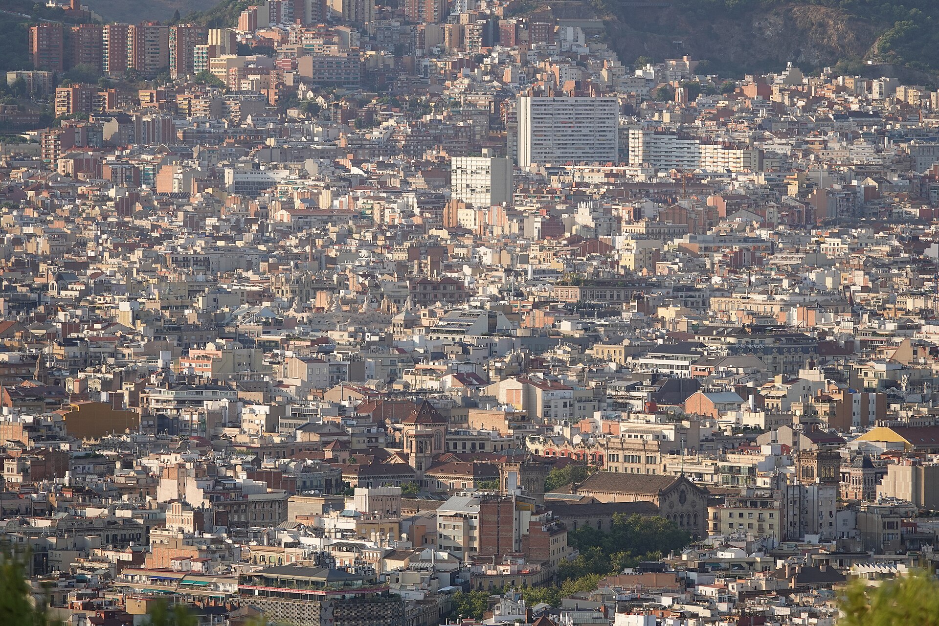 Dense rooftops and apartment blocks of the Eixample and Gracia districts of Barcelona
