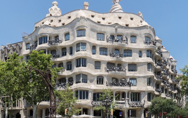 The undulating stone facade of Casa Mila on the corner of Passeig de Gracia in Barcelona