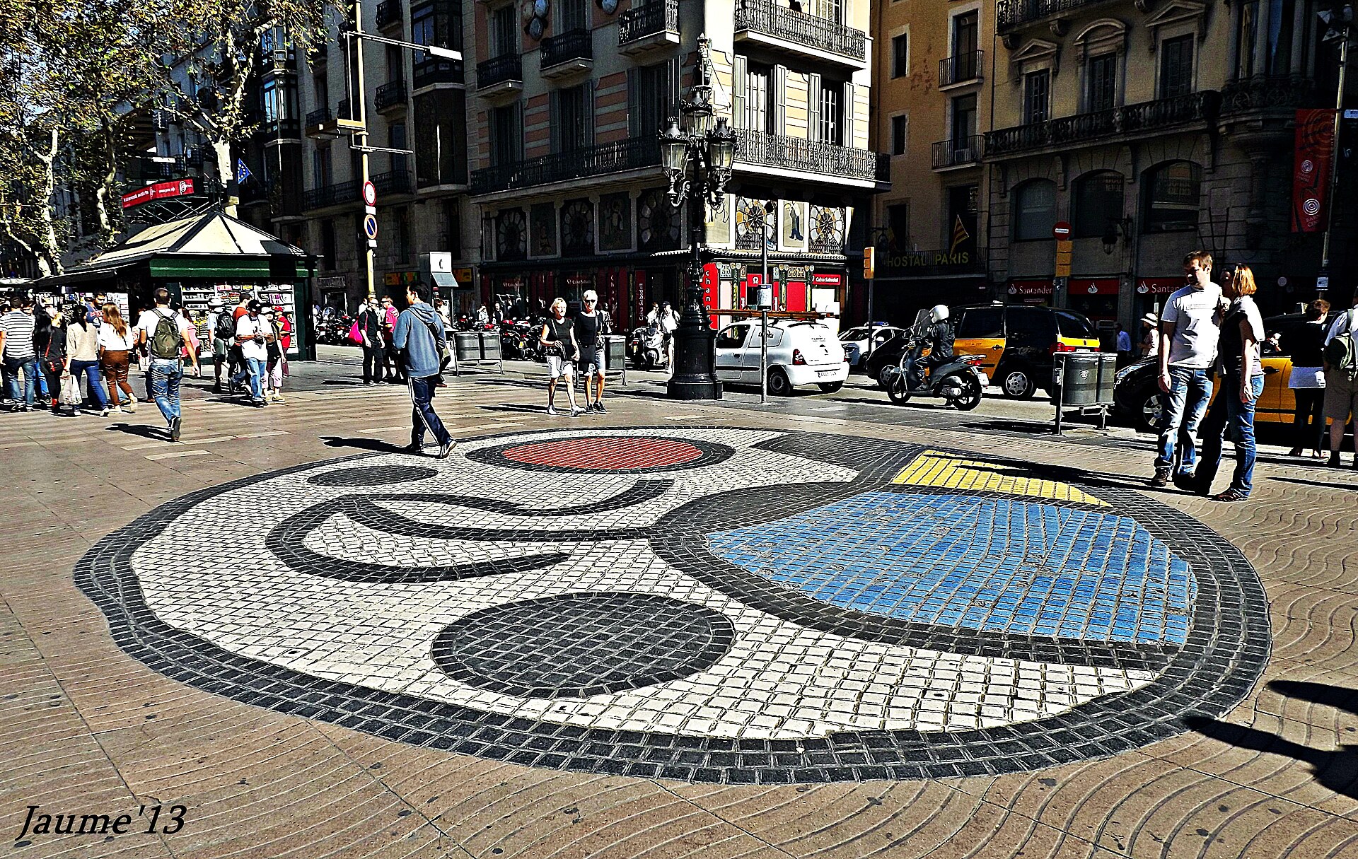 Joan Miro's circular pavement mosaic in red, blue, yellow and black on the Pla de la Boqueria on La Rambla